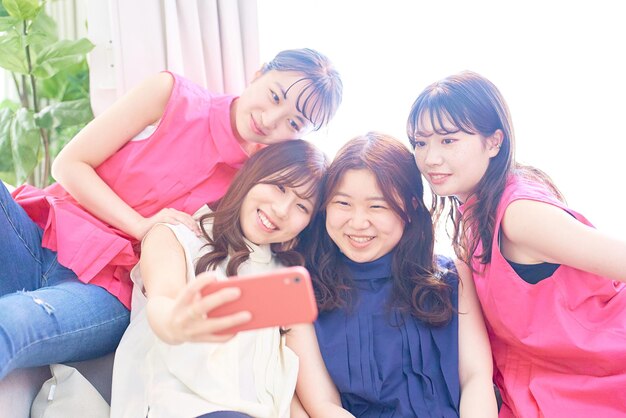 4 women taking a selfie at a girls' association