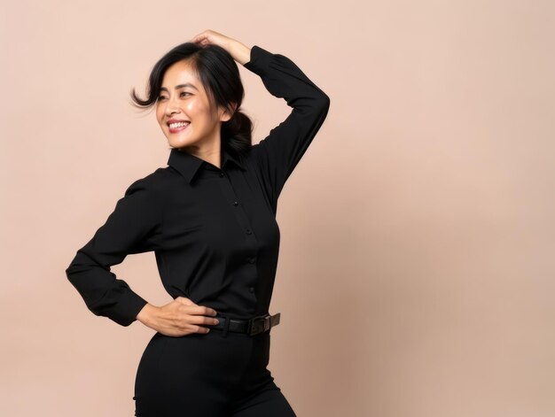 40 year old asian woman in emotional dynamic pose on solid background