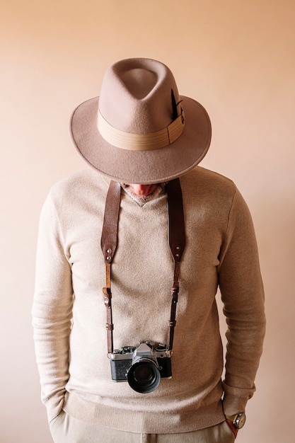 Photo 45 year old man with analog camera