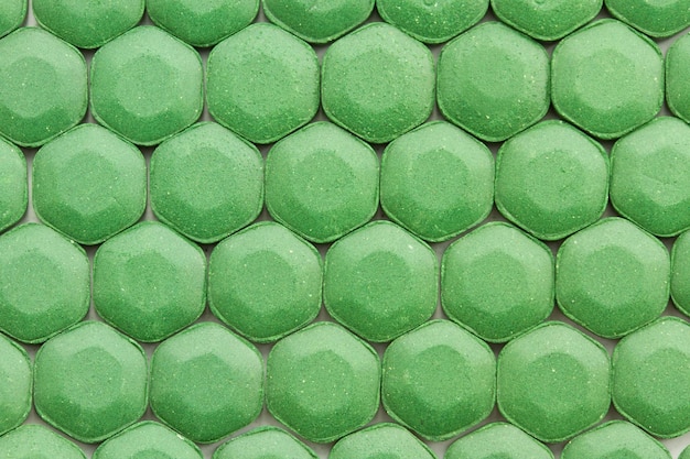 4K-afbeelding van Spirulina-tablettenachtergrond