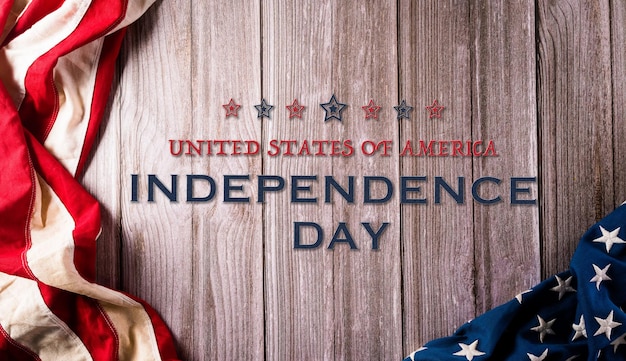 4th of July happy Independence day concept Vintage American flag and the text on old wooden background