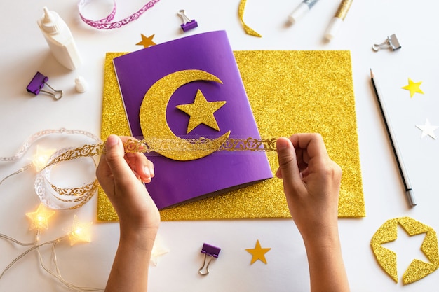 5 Diy Ramadan kareem card with golden crescent moon and a star.