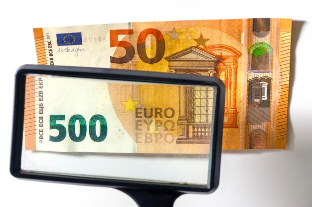 50 euros note observed with a loupe with an added 0