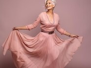 Premium AI Image 50 Year Old Woman Emotional Dynamic Pose