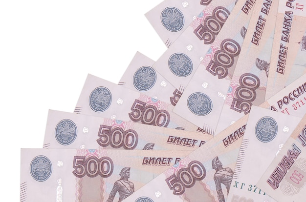 500 russian rubles bills lies in different order isolated on white. Local banking or money making concept. 