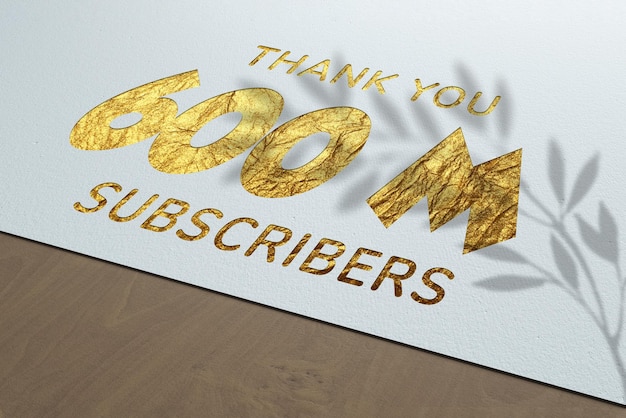 600 miljoen abonnees feestgroetbanner met Golden Paper-ontwerp