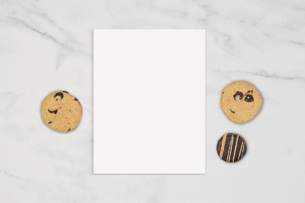 Photo 85x11 letter template with cookies on marble background with clipping path