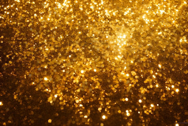 Фото Крупный план золотого блестящего фона на черном фоне генеративный искусственный интеллект