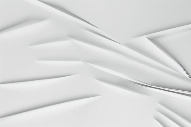 Фото Близкое изображение белой бумаги с изогнутым рисунком на ее поверхности и черным фоном с белым