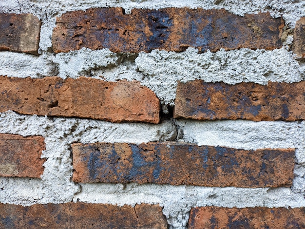 A close up van muur gemaakt van bakstenen gestructureerde achtergrond