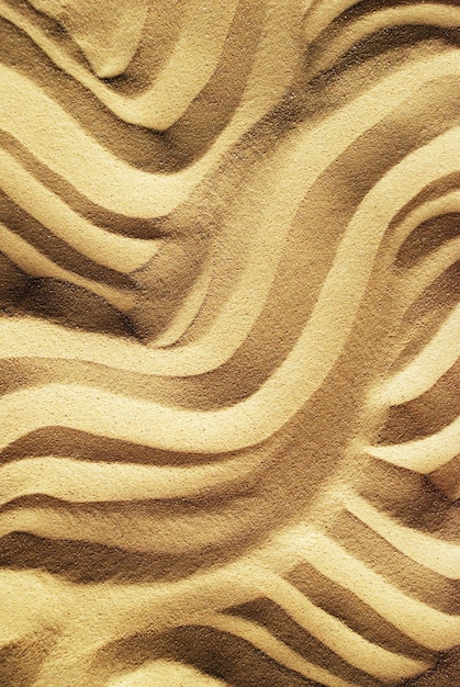 Фото Рисунок коричневого песка с коричневым рисунком