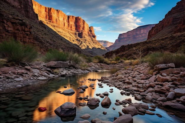 Фото a peaceful river winding through a canyon at sunri