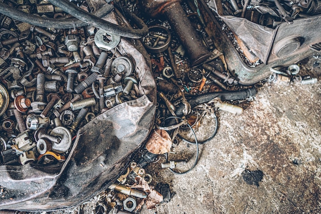 Фото Куча старых металлических гайки и болта