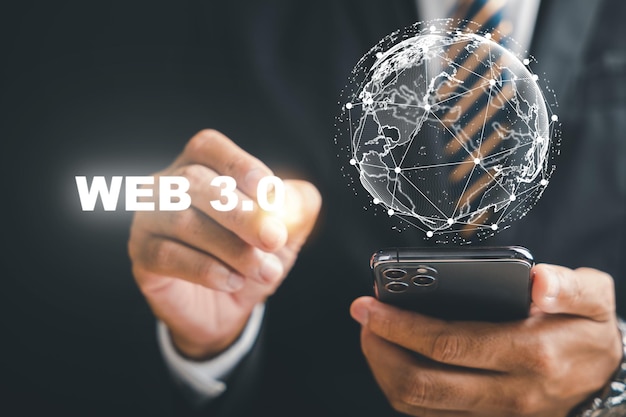 写真 ビジネスマンがこの新しいデジタル フロンティアの可能性を探求し、革新と成長の機会を解き放つ we3 コンセプトにより、スマートで未来的な電話が web 30 への入り口となる