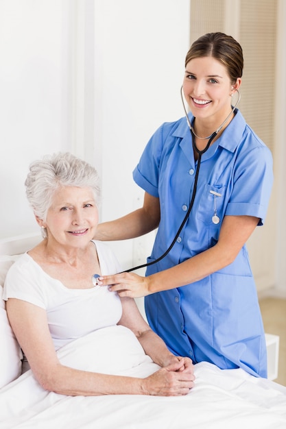 A Nurse Looks After Her Patients