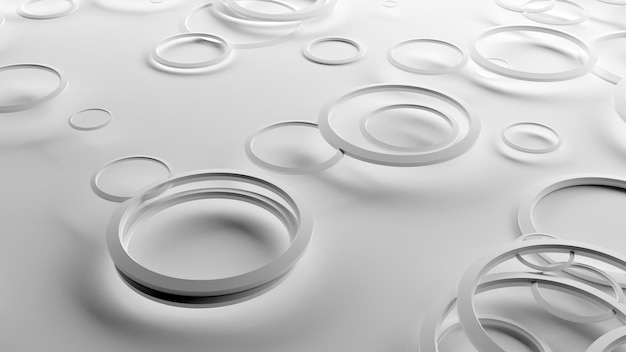 Фото Белый фон с кругами пластиковых колец 3d rendering