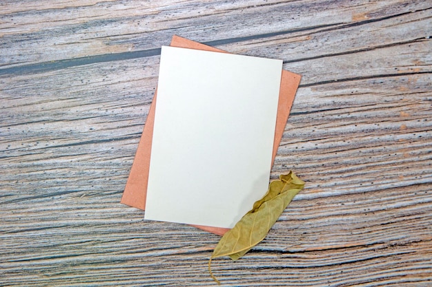 Photo a5 paper greeting card mockup with envelope