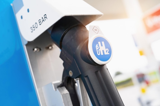 Aachen, Germany, January 2021: hydrogen logo on gas stations fuel dispenser. h2 combustion engine for emission free eco friendly transport.