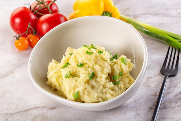 Aardappelpuree met groene ui