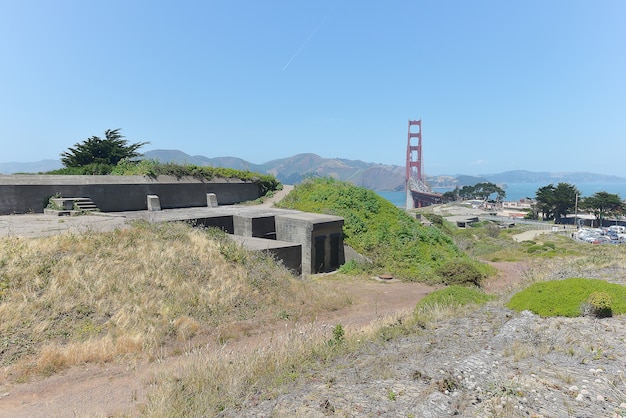 Abadoned military bunker and Golden Gate Bridge at Fort Point in San Francisco