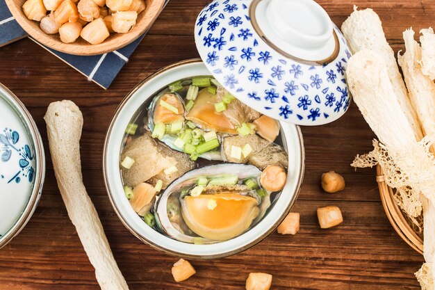 Abalone and Morel Chinese soup on a bowl