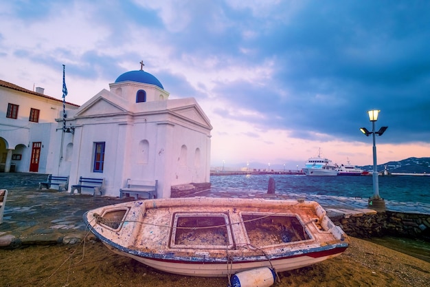 Abandoned boat near church