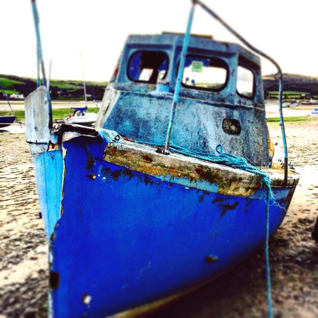 Abandoned boat in sea