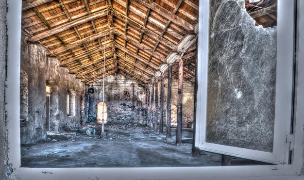 Abandoned building seen from the window