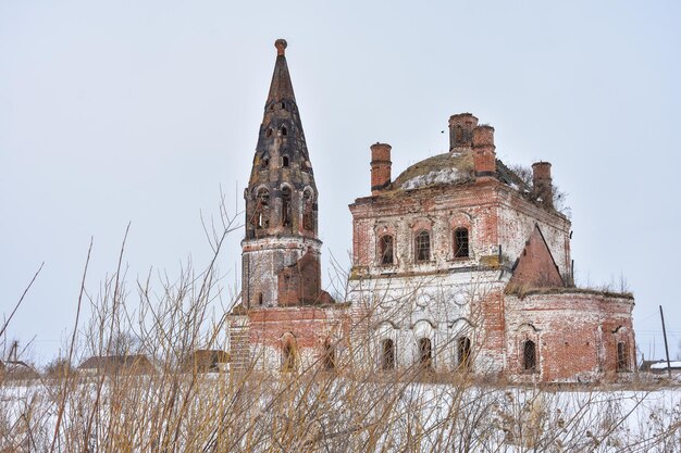 Abandoned church in winter, abandoned temple in outback of Russia