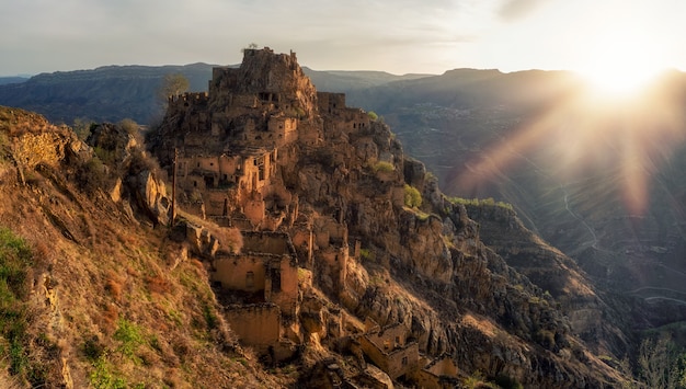 Abandoned ethnic aul. Old abandoned ghost town of Gamsutl, Dagestan, Russia. Panoramic view.