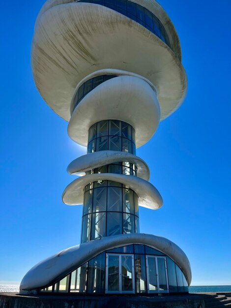 Abandoned futuristic lighthouse against the sky