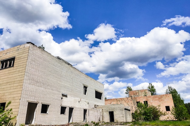 Abandoned high-rise buildings, city. Clean quarts and buildings without windows or doors.