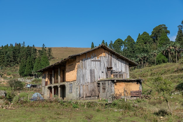 Abandoned houses on rural meadows