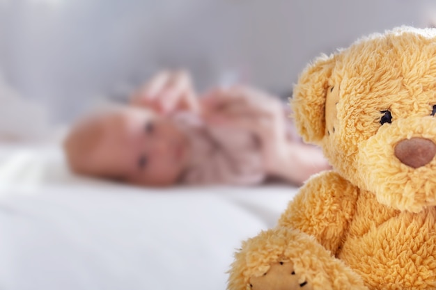 Abandoned newborn children teddy bear close up