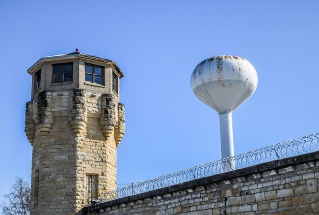 Abandoned prison and wall and guard tower