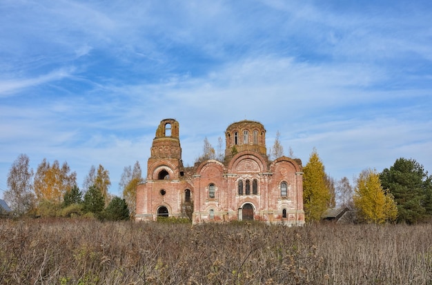 Abandoned red brick Christian church in depths of Russia abandoned building in wilderness