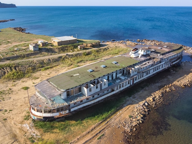 Abandoned steamer stranded rusty old cruise steamer ship skeleton stranded ship