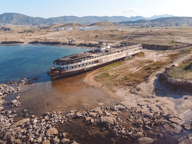 Abandoned steamer stranded rusty old cruise steamer ship skeleton stranded ship