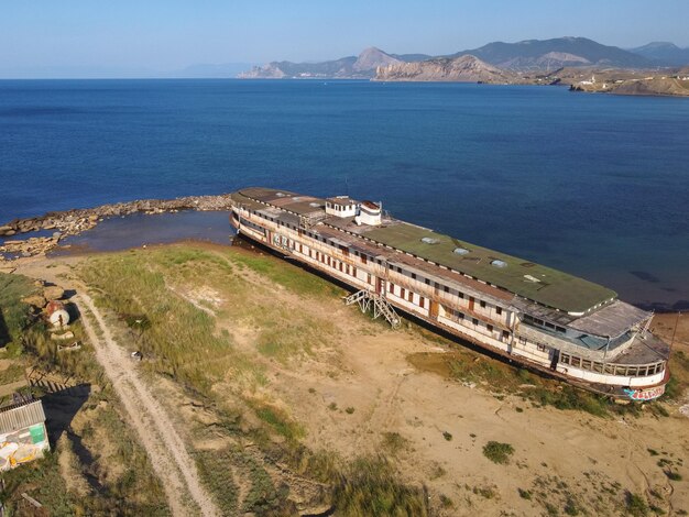 Abandoned steamer stranded rusty old cruise steamer ship skeleton stranded ship