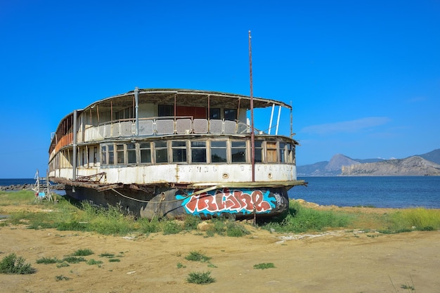 Abandoned steamer stranded rusty old cruise steamer ship skeleton stranded ship