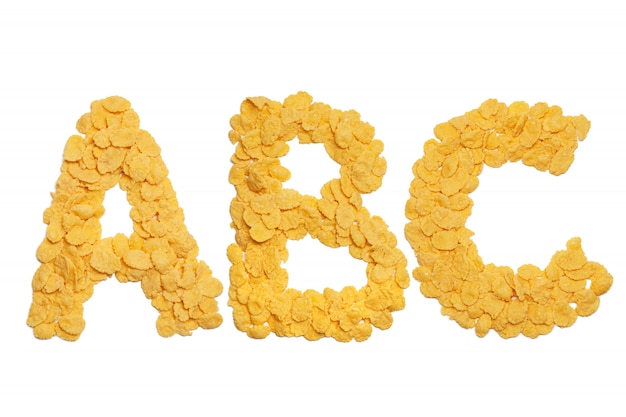 Photo abc letters made of cornflakes isolated