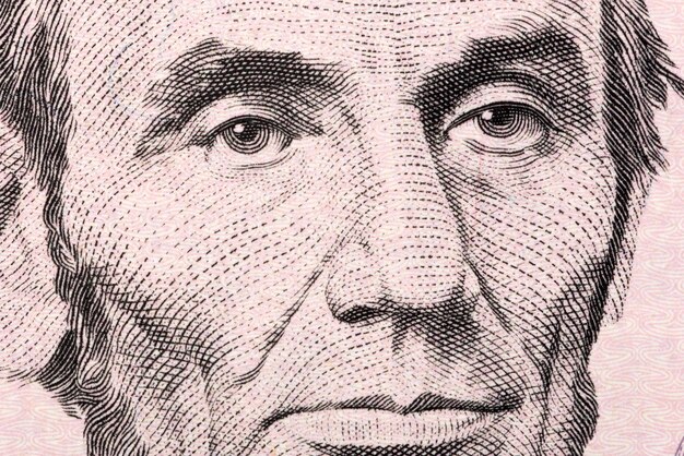 Abraham Lincoln a closeup portrait on US five dollars