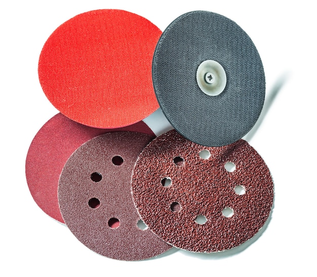 Abrasive discs and holders isolated on white
