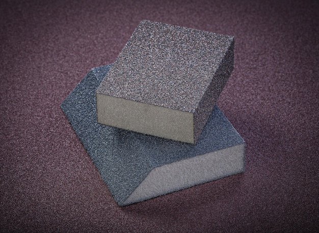 Abrasive sponges on polishing paper top view.