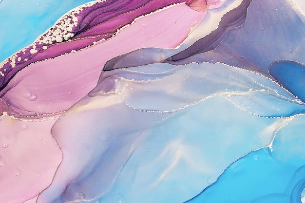 青い紺碧のピンクの色調の抽象的なアルコールインクの背景