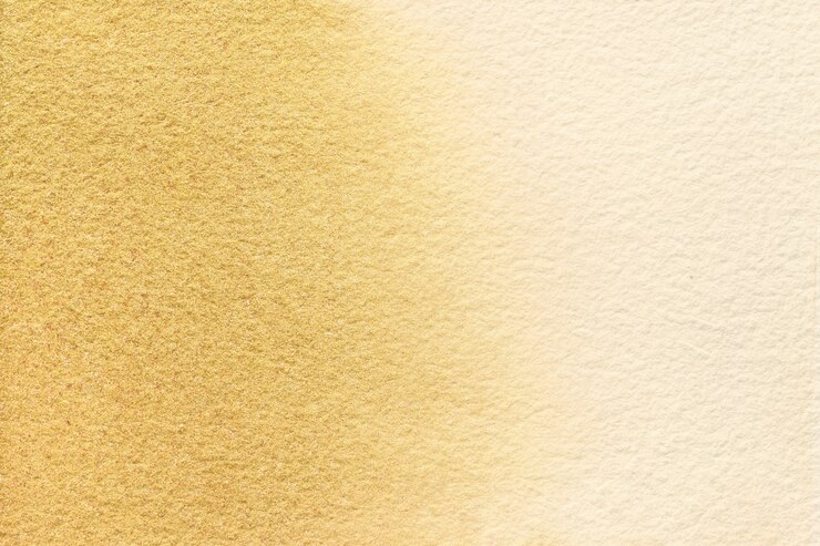 抽象芸術の背景ライトベージュと黄金色。柔らかい茶色のグラデーションでキャンバスに水彩画。