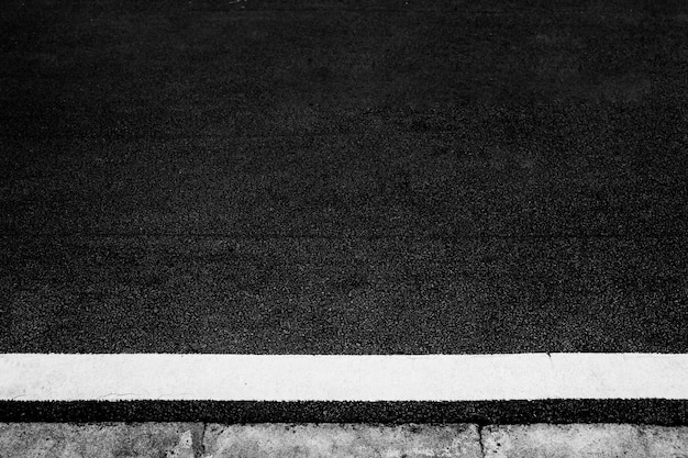 Abstract Asphalt road surface with white line texture for add text message or design art work Concept logistic