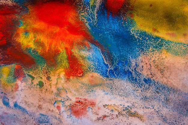 Abstract background basis dried streaks of multicolored paint with cracks