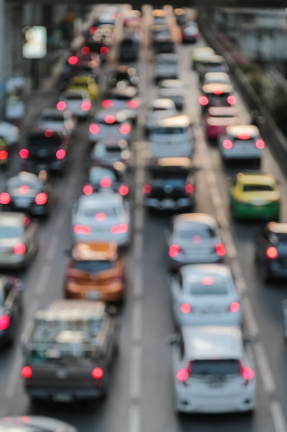 Foto sfuocatura astratta del fondo dell'ora di punta dell'ingorgo nel commercio della grande città