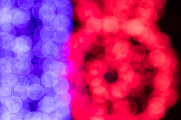 Abstract background. Blurred colorful circles bokeh of Christmas lights